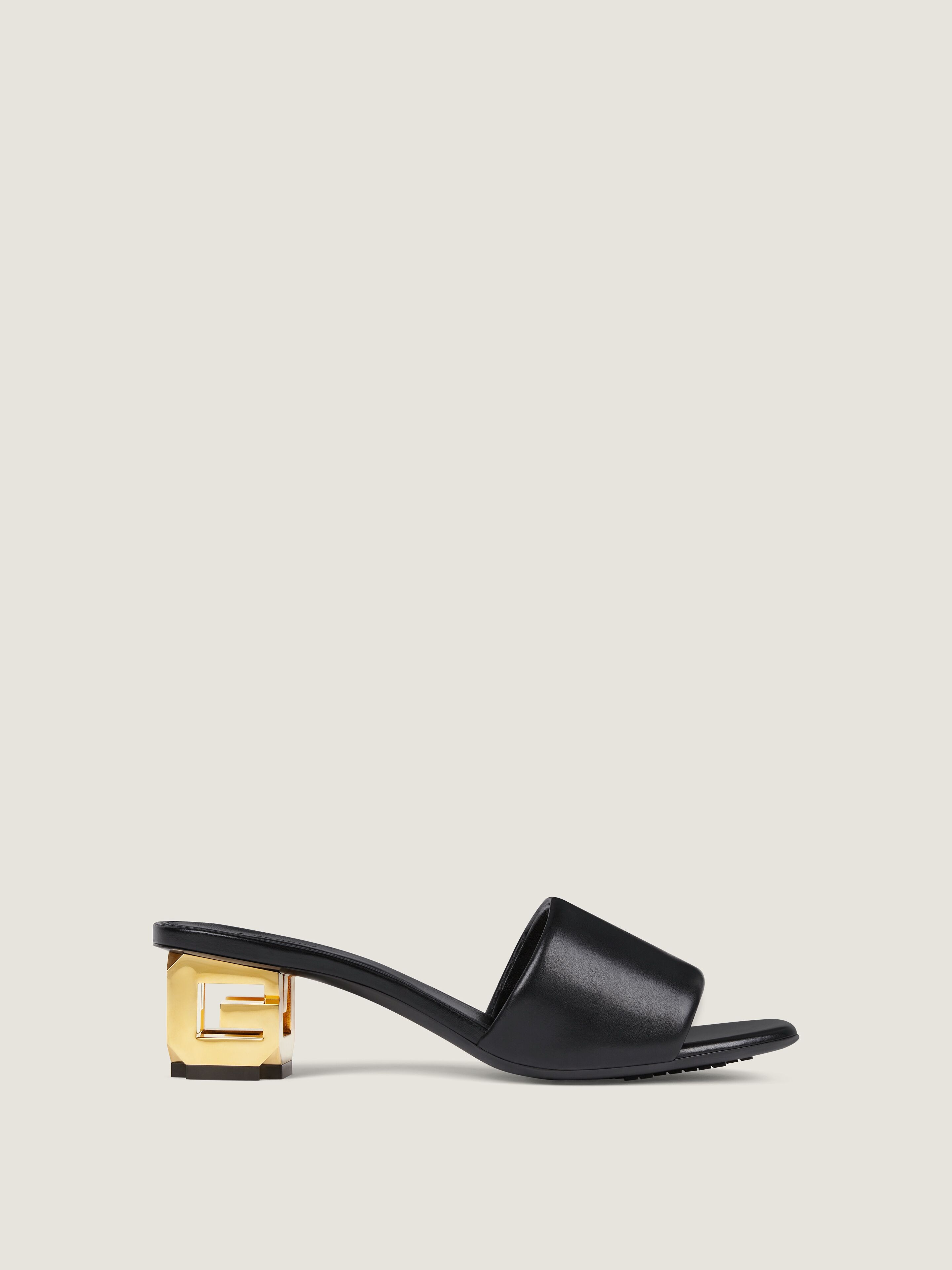 G Cube heeled mules in leather